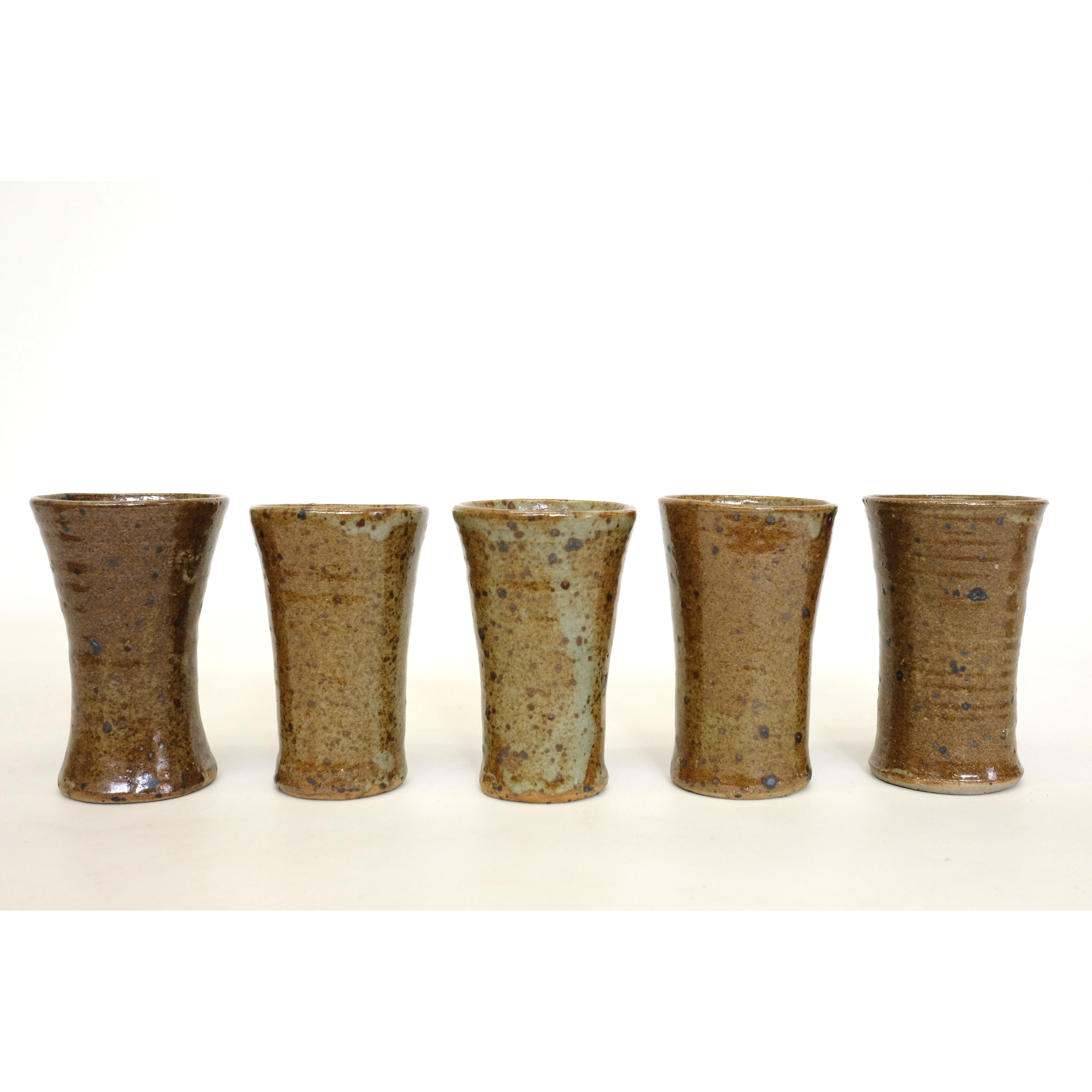 Sandstone teapot from La Borne and 5 cups signed Tiffoche, 1970s.