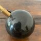 Diabolo lamp with marble counterweight