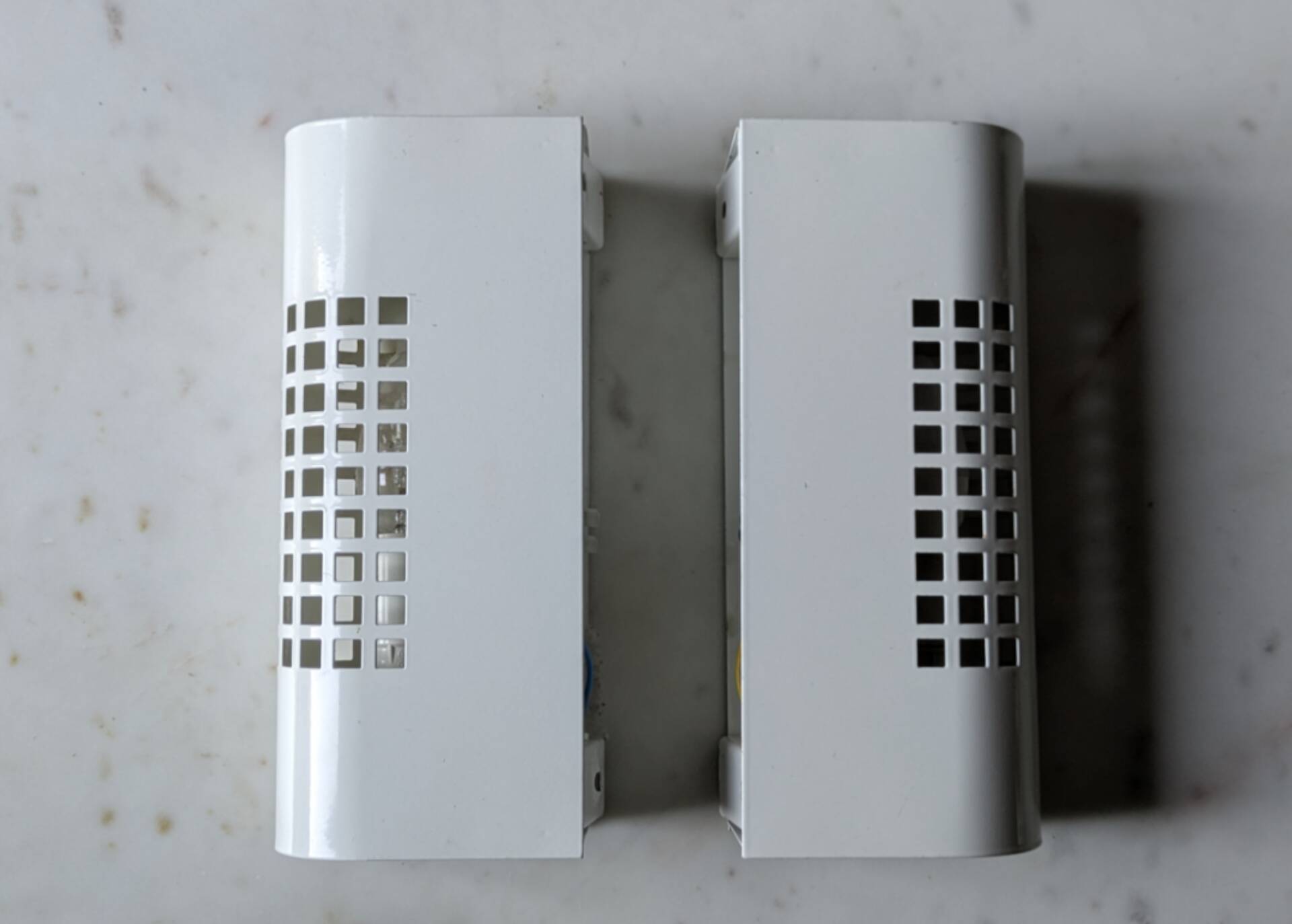 Pair of vintage wall sconces in sheet metal/Perriand/Mategot style.