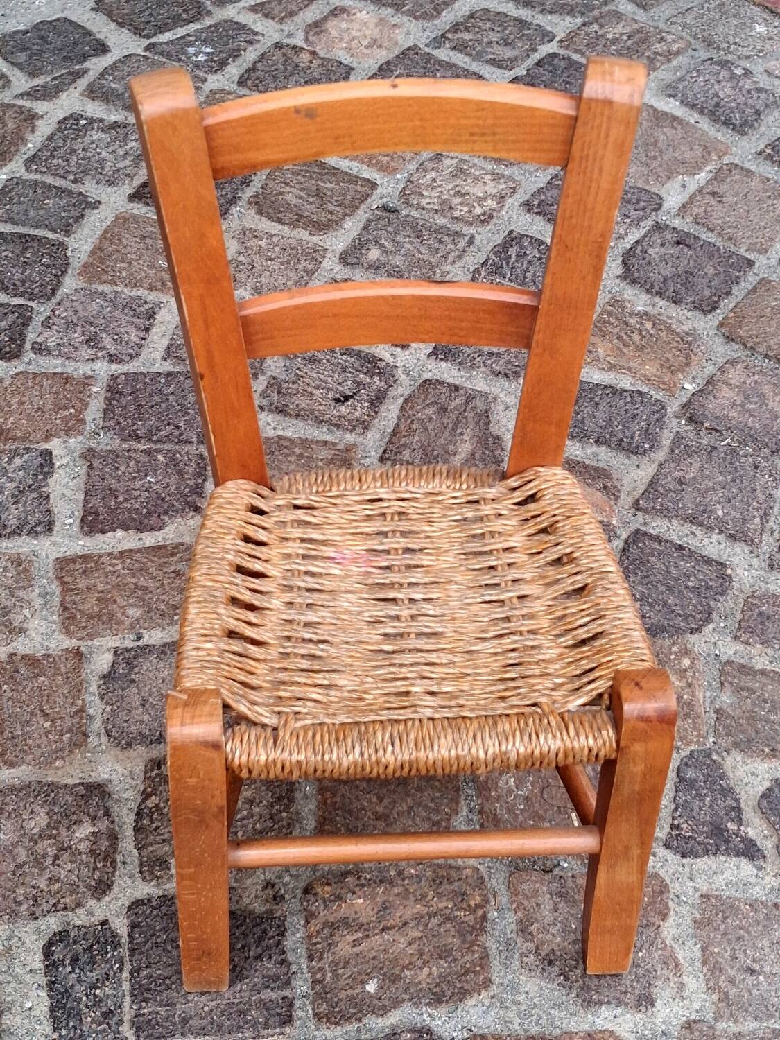 Small chair for children, folk art, wood and straw.