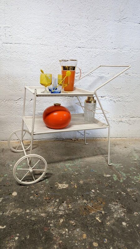 Perforated metal service trolley