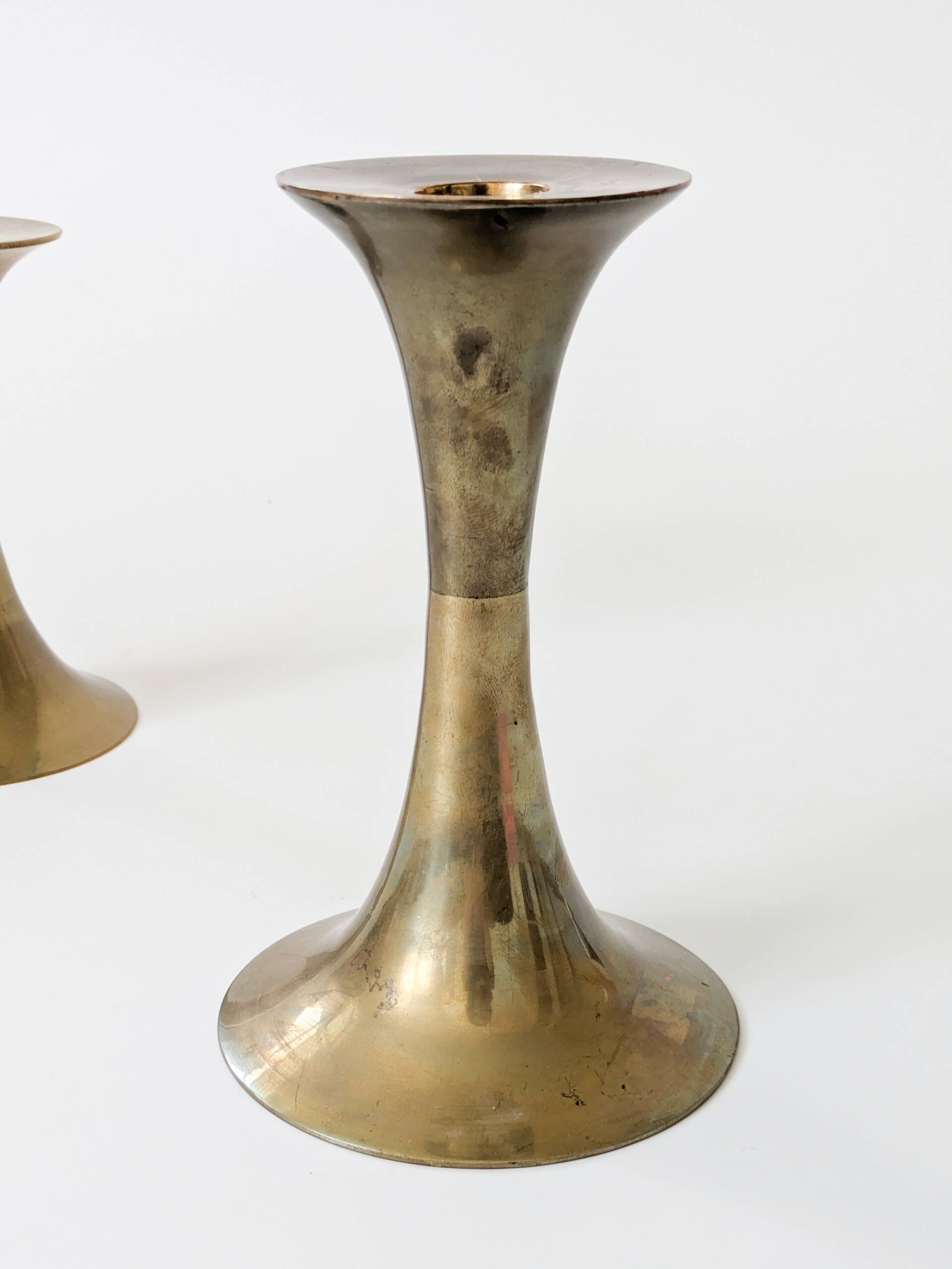 Pair of Midcentury brass candlesticks, flared shape.