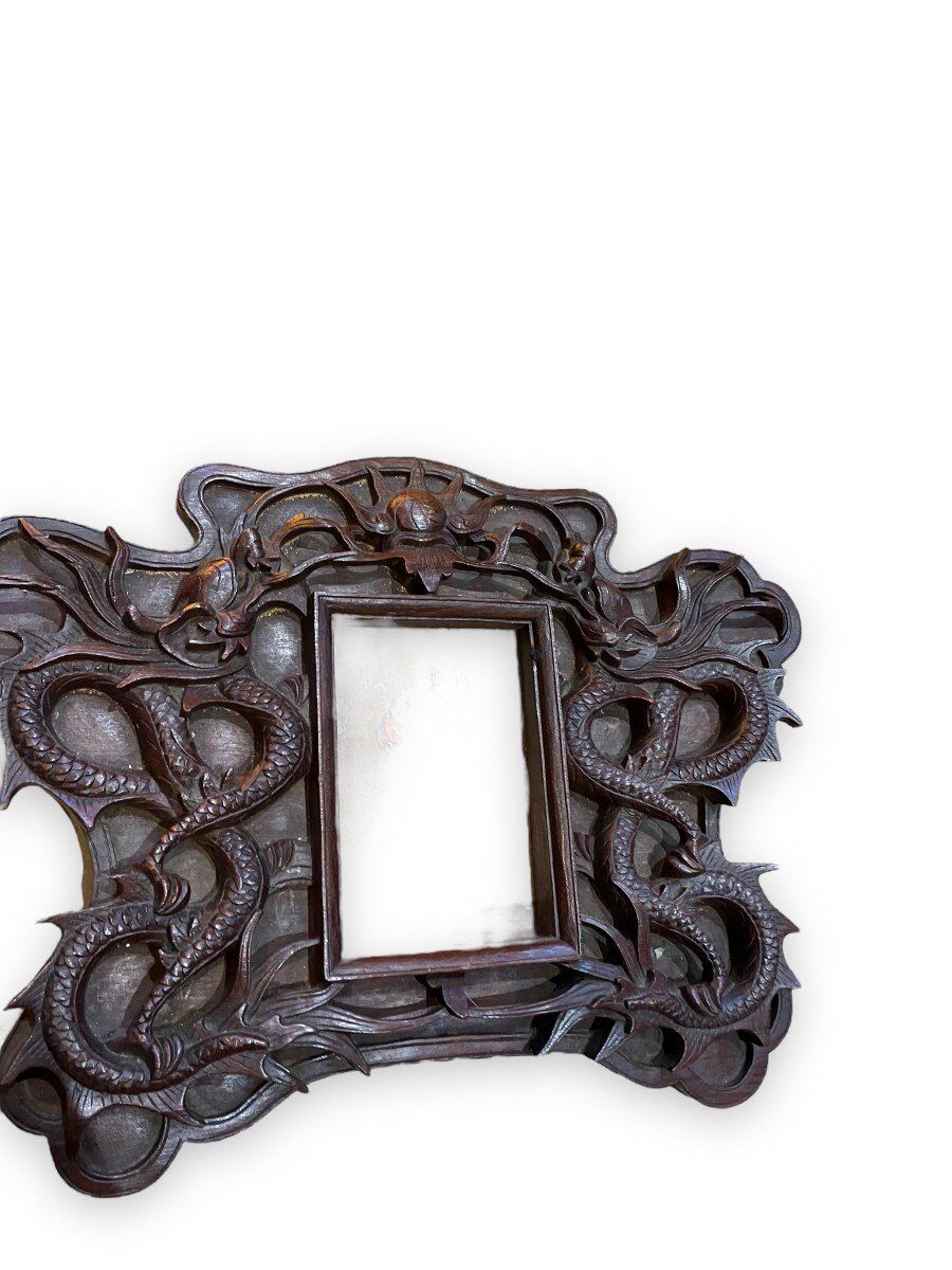 Pair of exotic wooden frames with dragons