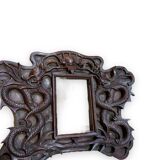 Pair of exotic wooden frames with dragons