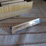 Old metal knife rests