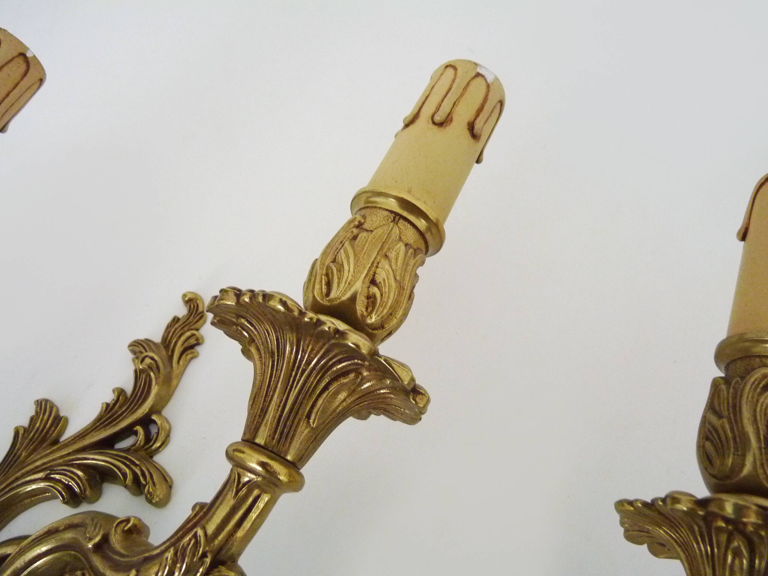 Vintage pair of double wall sconces in bronze from the 1960s.