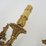 Vintage pair of double wall sconces in bronze from the 1960s.