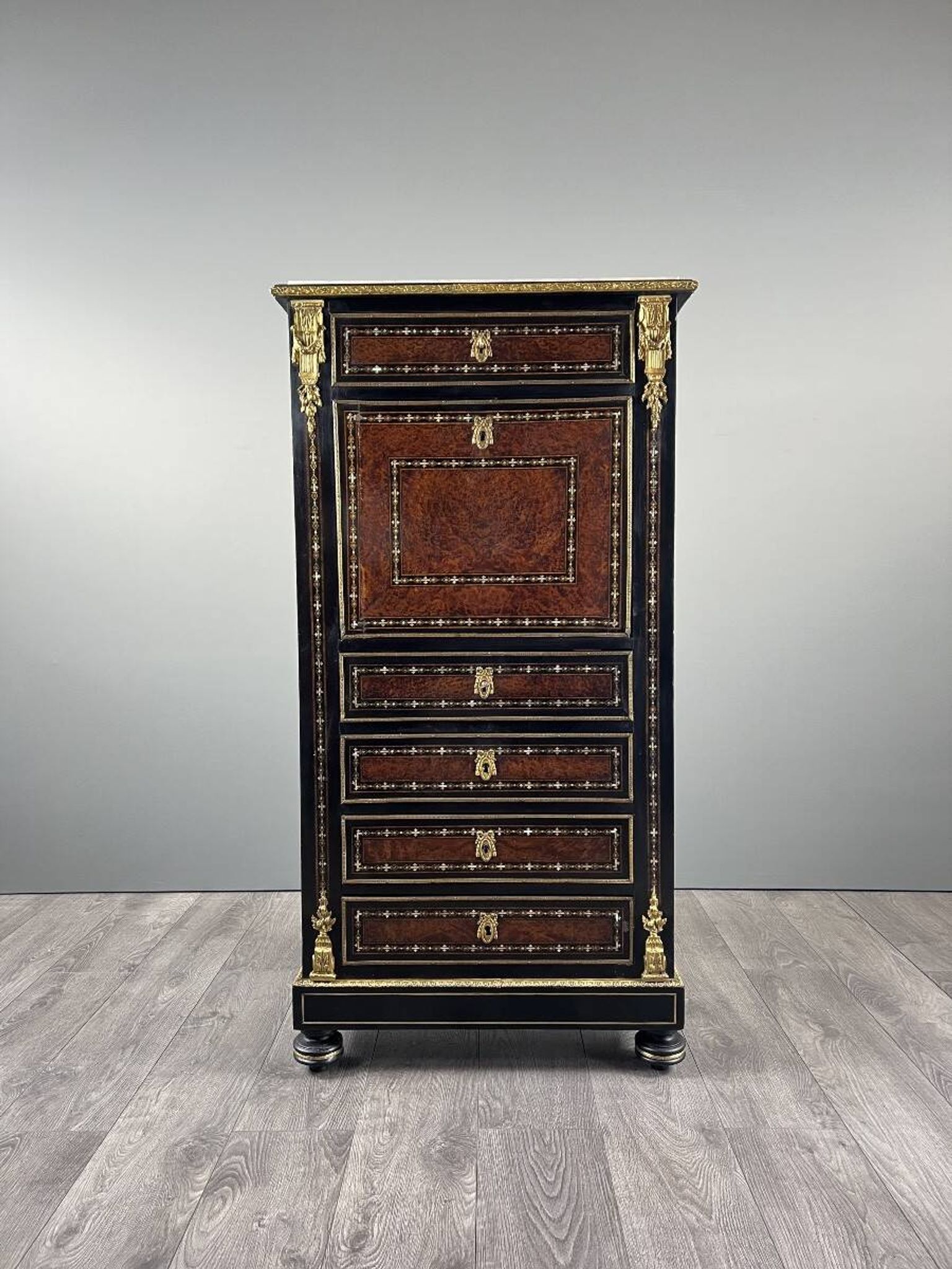 Secretary from the time of Napoleon III in marquetry and gilded bronzes, 19th century.