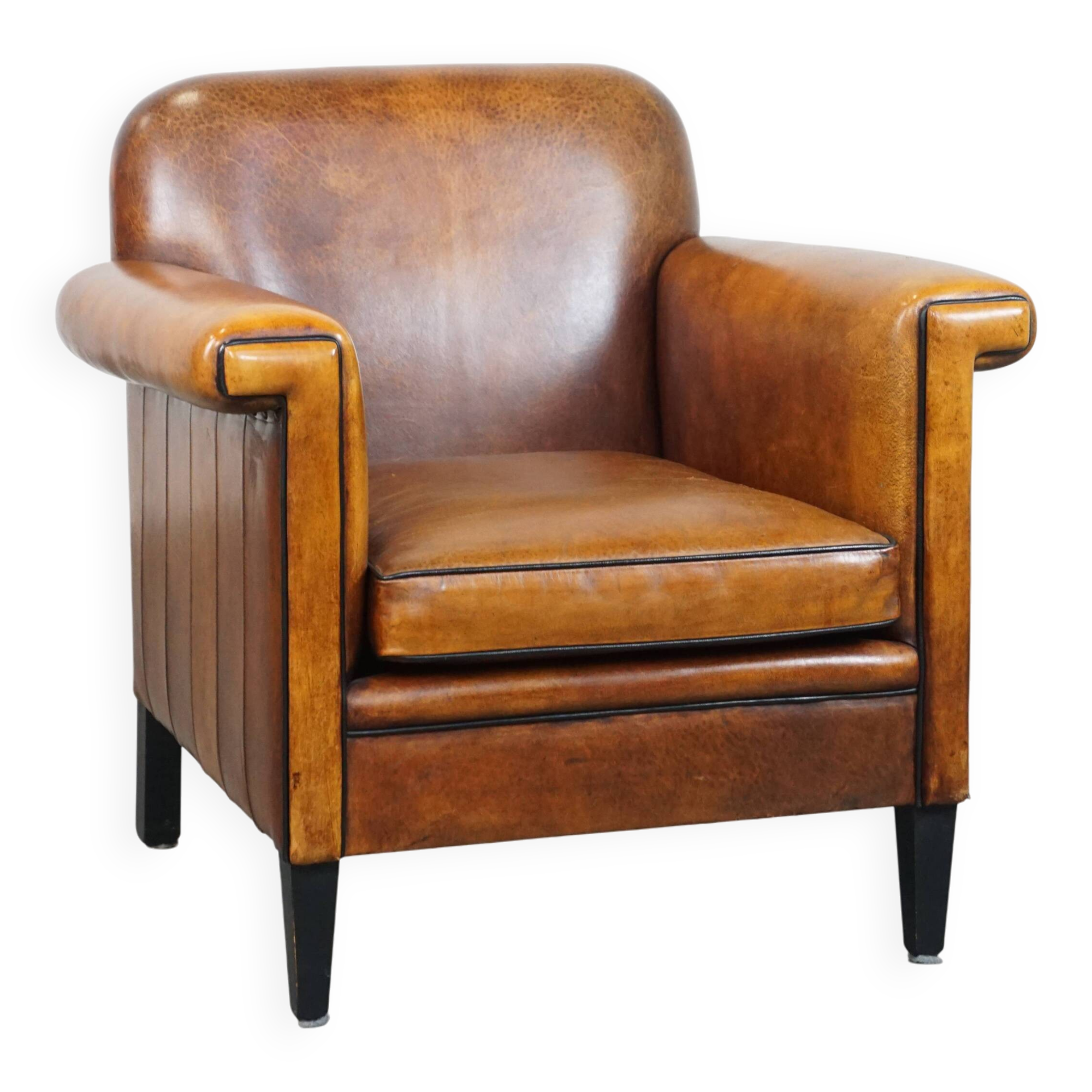 Sheep leather Art Deco design armchair finished with black piping