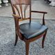 Mid-20th century solid cherry wood office chair.