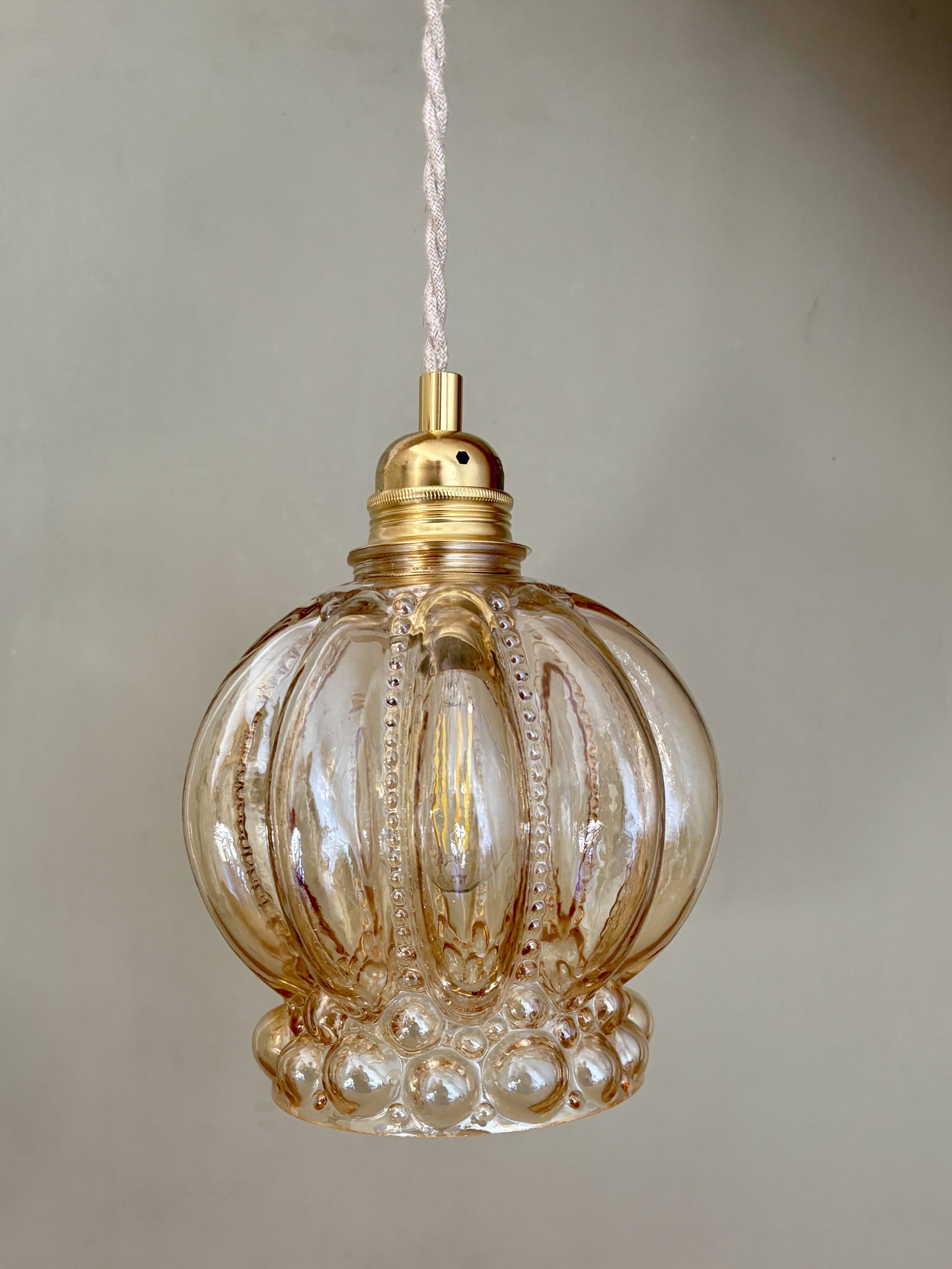 Vintage globe pendant light in amber bubble glass