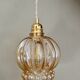 Vintage globe pendant light in amber bubble glass