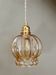 Vintage amber glass suspension globe