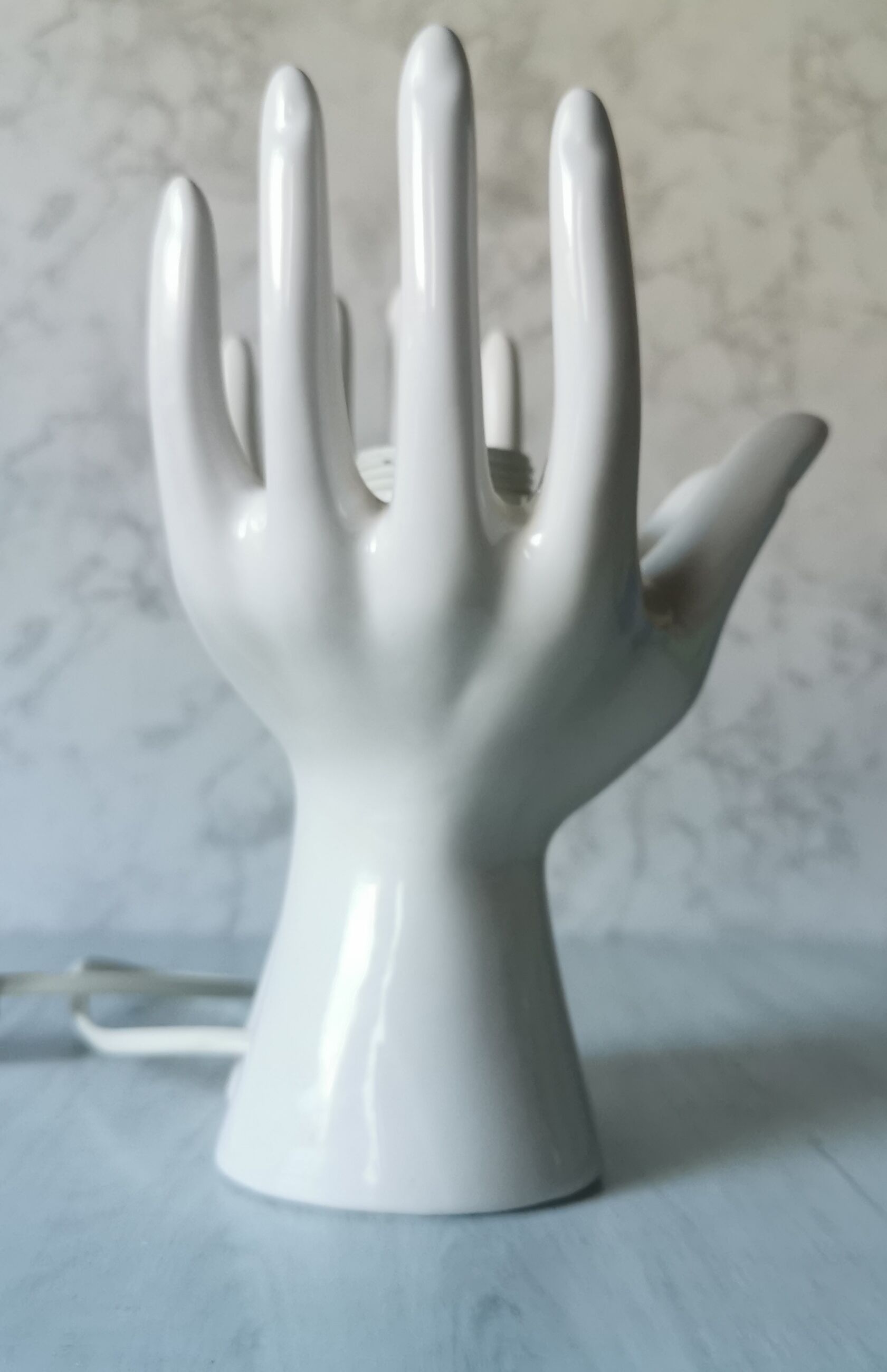White ceramic hand lamp