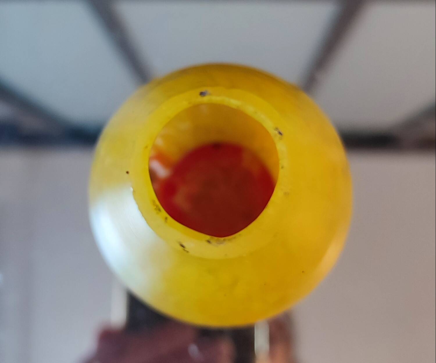 Curved vase made of glass paste