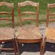 17 old straw chairs