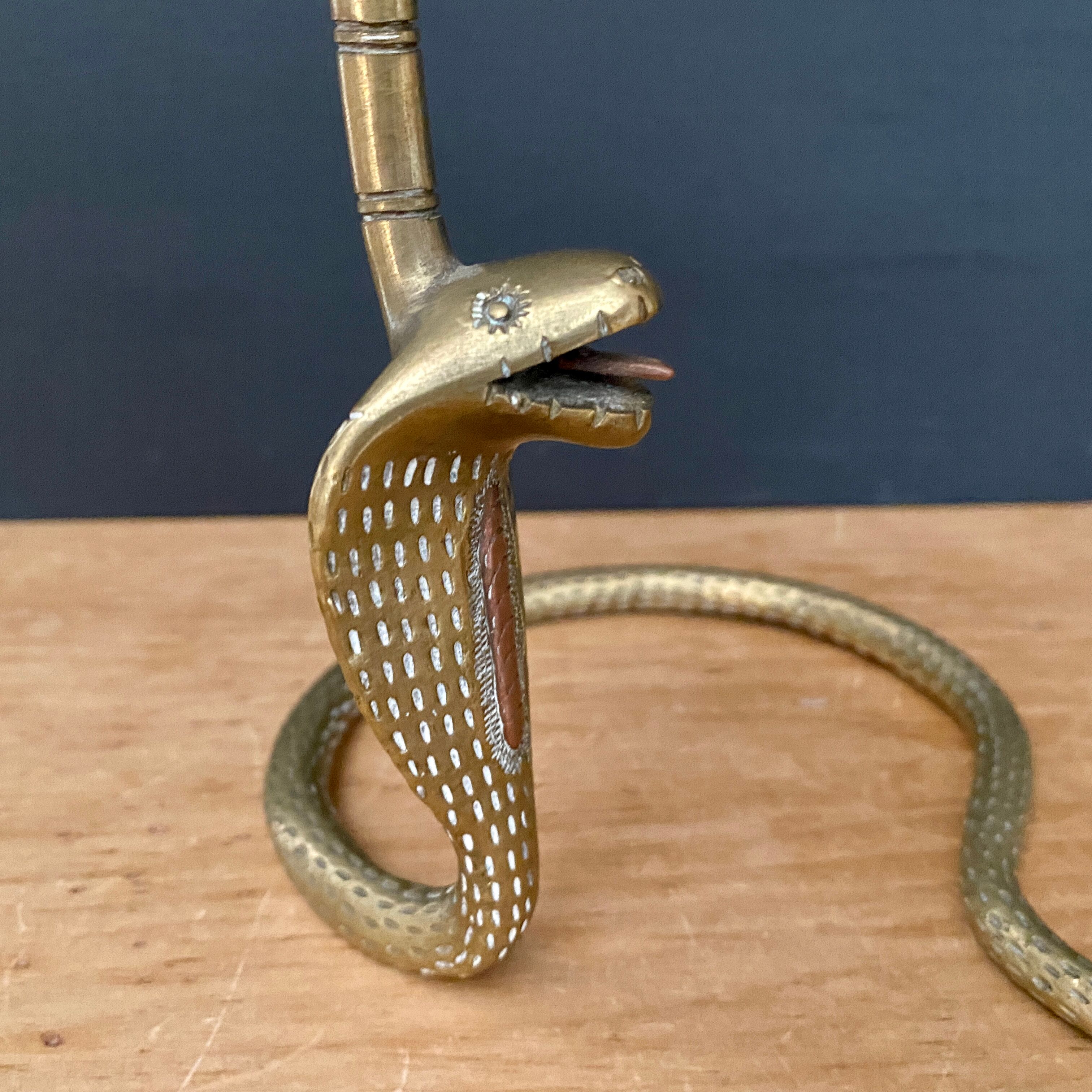 Brass candle holder in the shape of cobra -snake