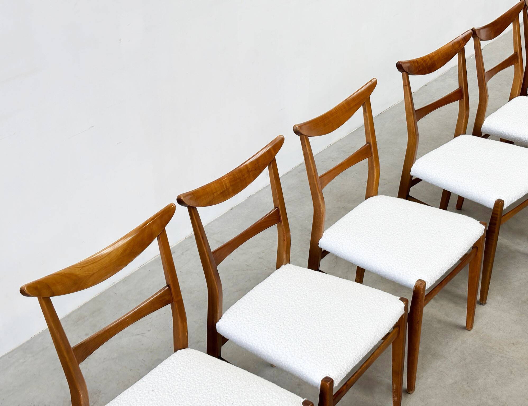 Set of six walnut Lübke dining chairs