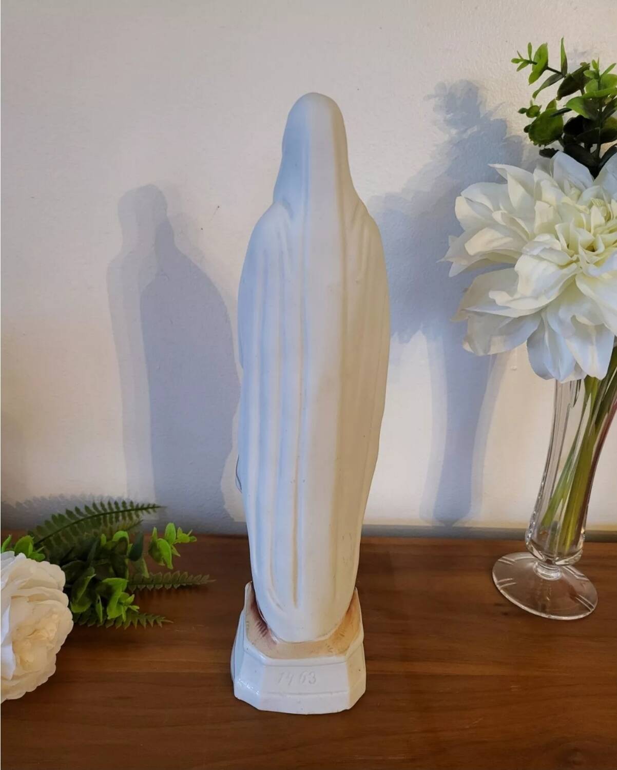 Religious statuette of the Virgin Mary in bisque porcelain