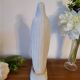 Religious statuette of the Virgin Mary in bisque porcelain