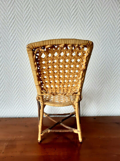 Vintage rattan doll chair
