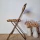Chaise pliante vintage Lafuma modèle "Chantazur" à motif fleuri