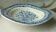 Earthenware dish in the wavy model of Delft blue, Holland.