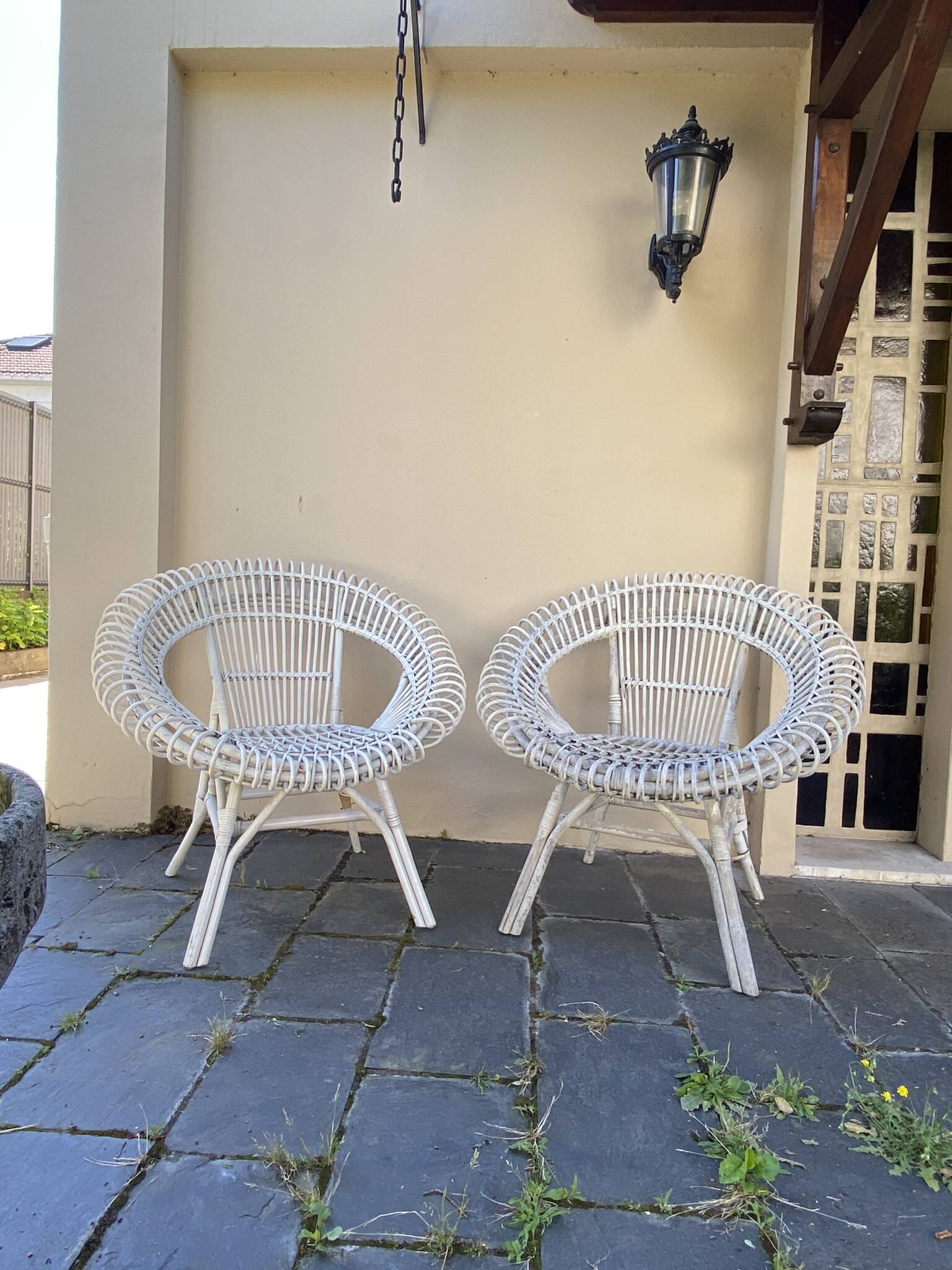 Vintage white rattan armchair