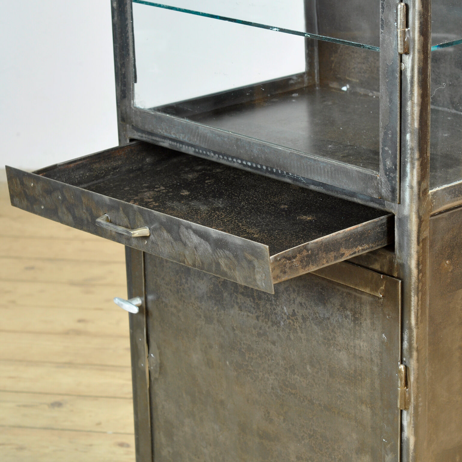 Polished iron medicine cabinet, 1950s