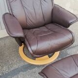 Pair of vintage armchairs with ottoman