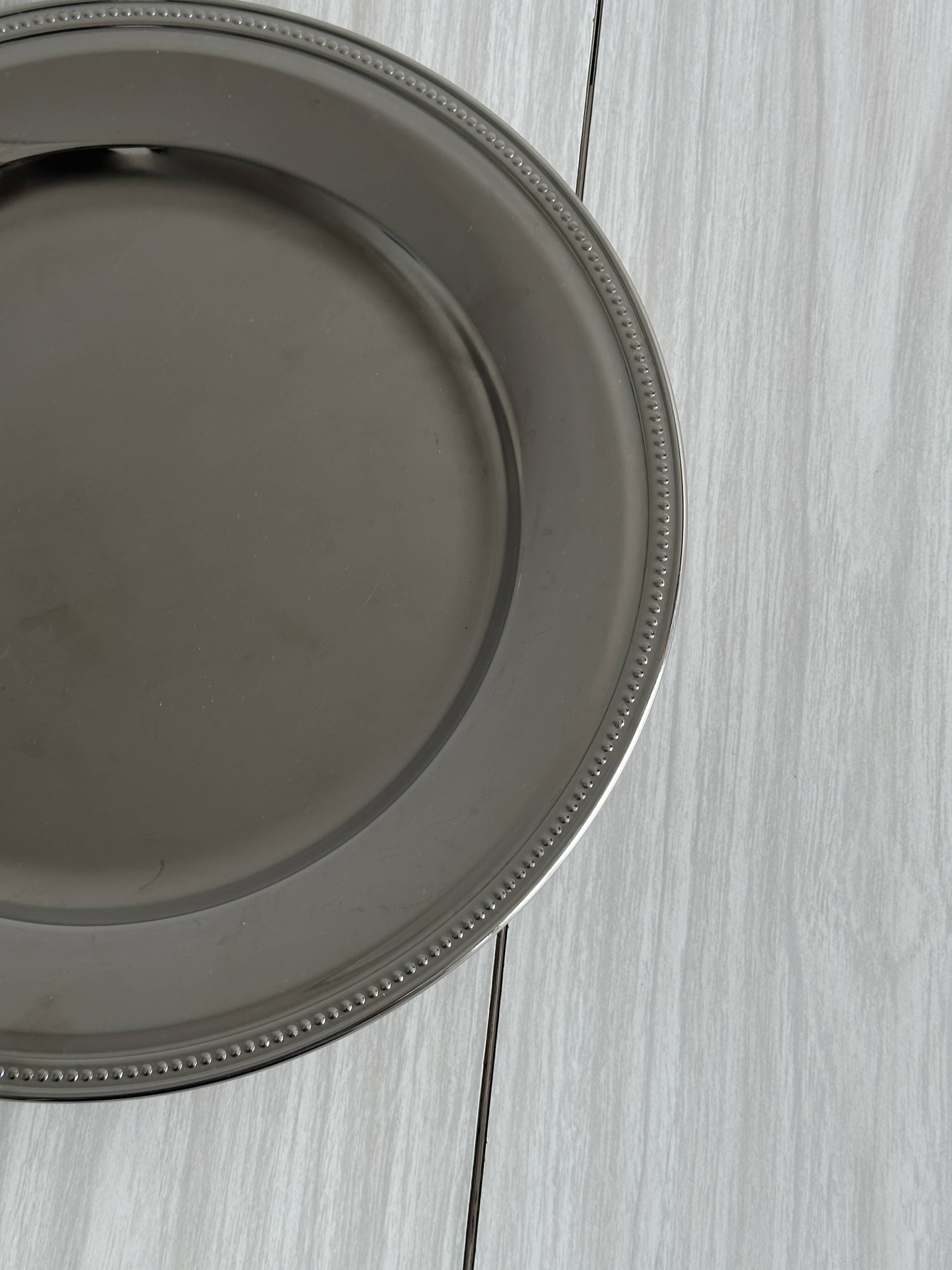 Large shiny stainless steel tray