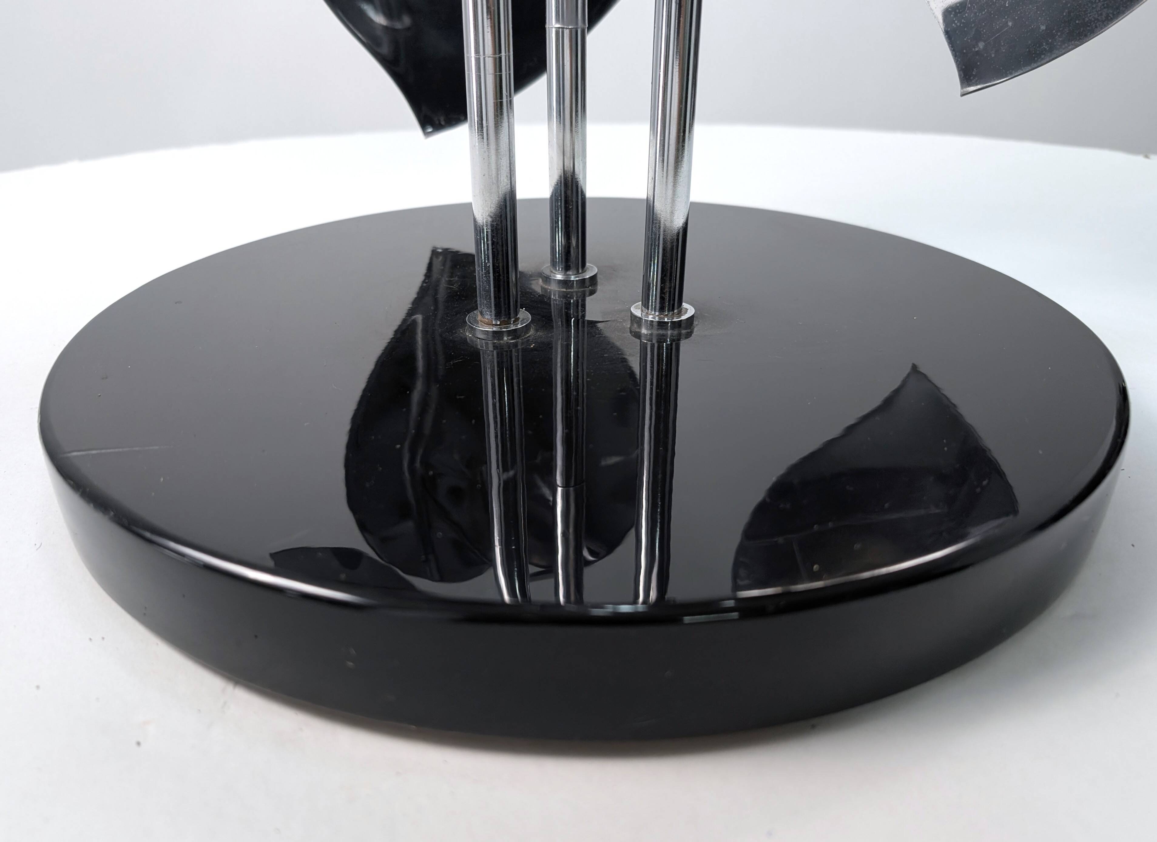 Standing sculpture with chrome leaves and circular base, 1970s