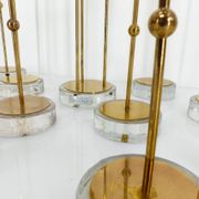 Set of 15 Scandinavian candle holders in brass and glass, Gunnar Ander, Ystad Met
