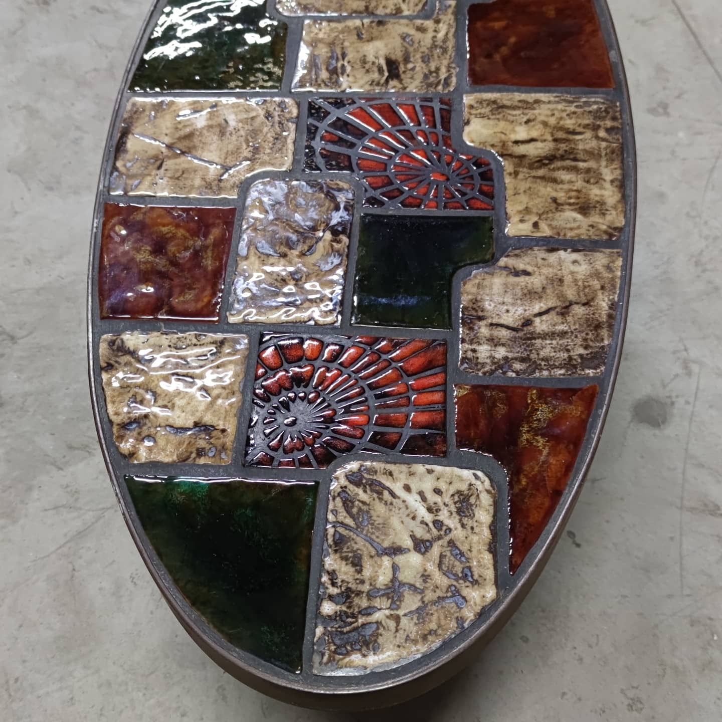 Ceramic and steel elliptical table