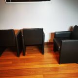 6 faux leather chairs on wheels