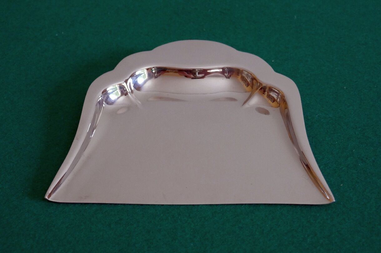 Collects stainless steel table crumbs