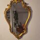 Miroir en bois d'or à  l or,style Louis 15
