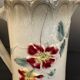 Antique pitcher in slipware with floral decoration – red and cream floral design