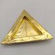 Cecile & jeanne: triangular gold-plated metal pocket tray with hieroglyph decoration.