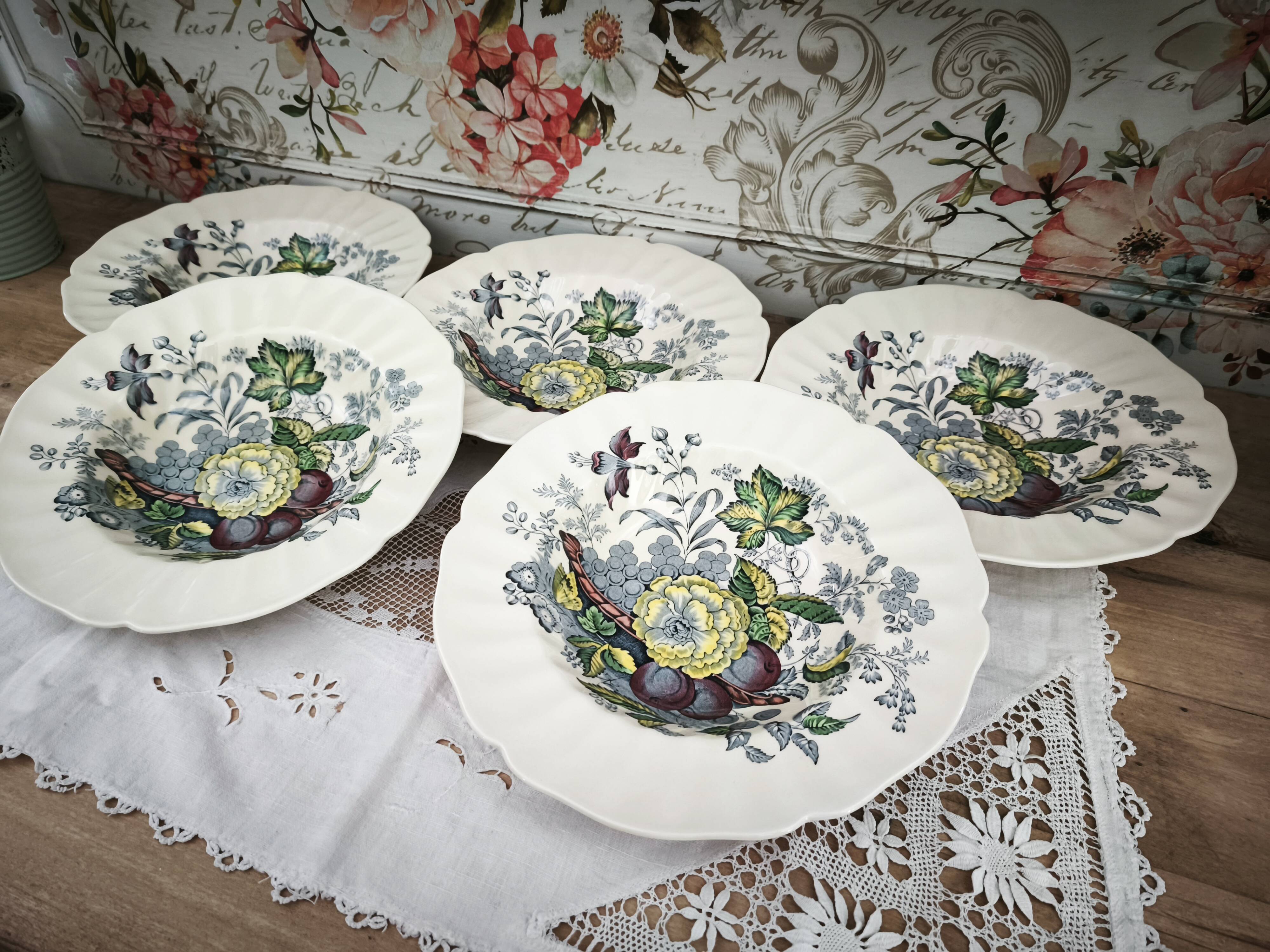 Set of 5 Royal Doulton deep plates in the Kirkwood pattern.