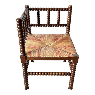Vintage corner chair in turned oak and straw