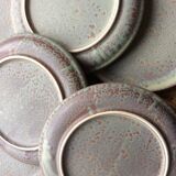 Set of 12 large and 11 small sandstone plates