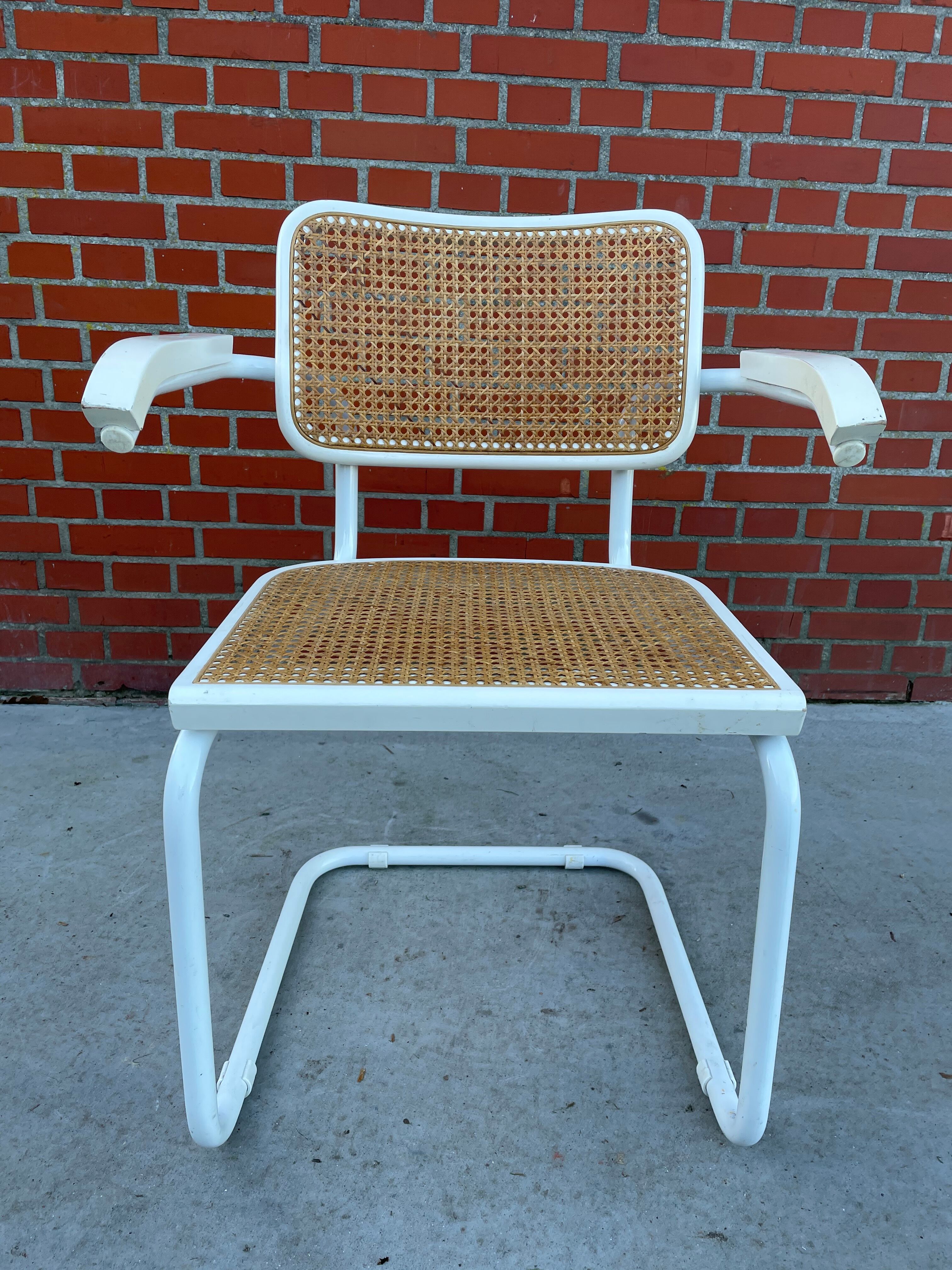 Cesca Chair model with armrest in white