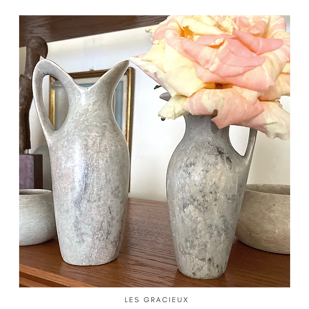 2 jugs in rough cut stone