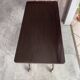 TV stand on casters, 2 brown Formica shelves, 1960s