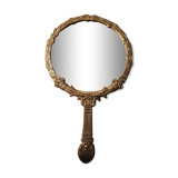 Antique mirror facing round hand in bronze 23cm