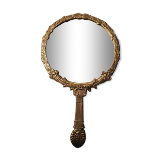 Antique mirror facing round hand in bronze 23cm