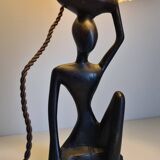 Ebony lamp with seated woman / 1930s
