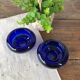 Duo de bougeoirs vintage en verre bleu