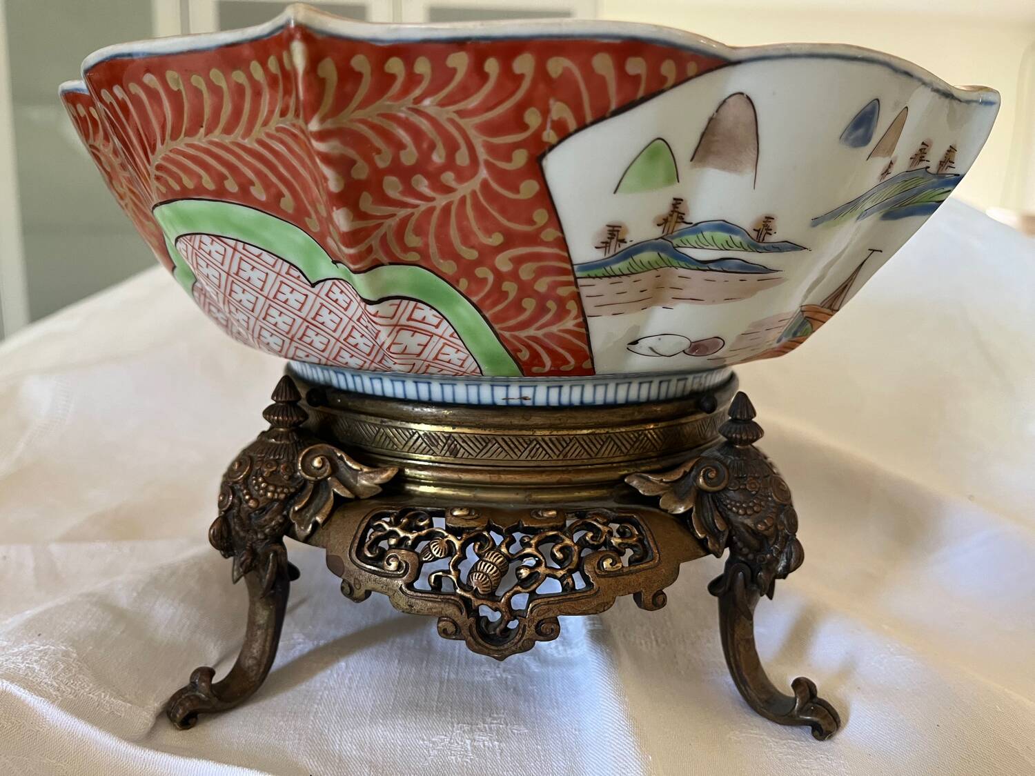 Chinese ceramic cup landscape patterns brass base supported by 4 elephants lai